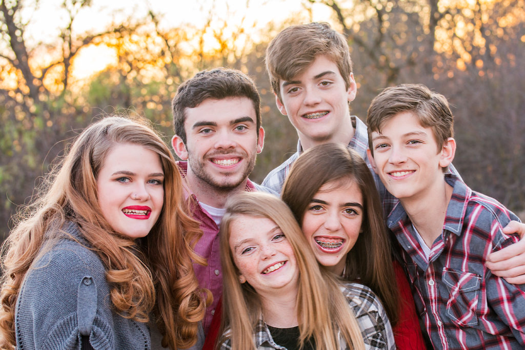 family portrait of six siblings at wiggly park